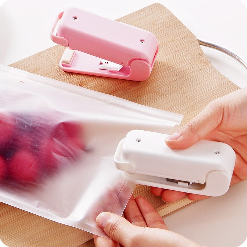 

Ручной пресс для герметизации Mini Sealing Machine, розовый